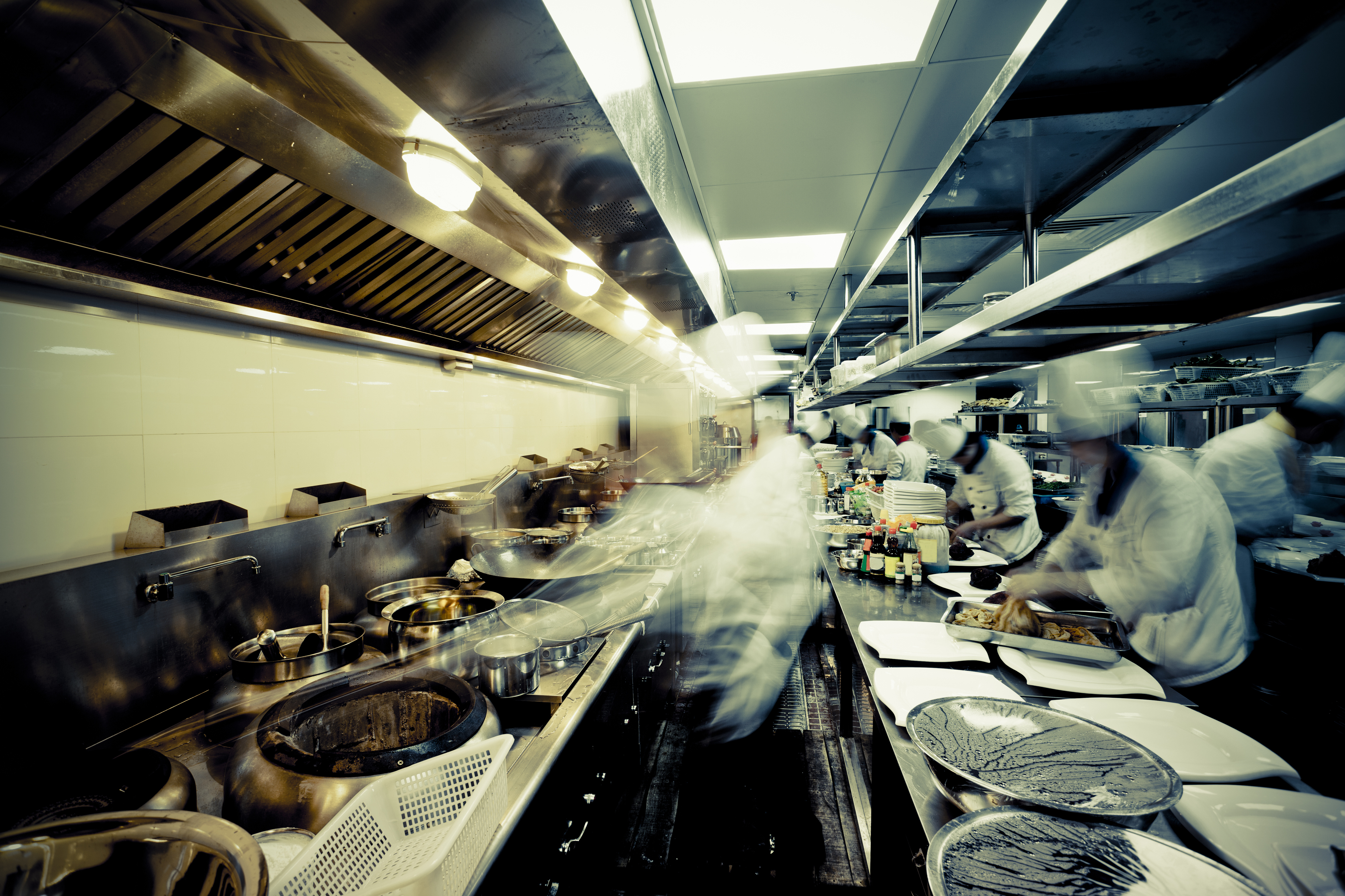 motion chefs  of a restaurant kitchen